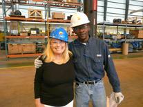 Shawn Franklin and Lana Keeton Inspect Galvalume Steel Coils on Steel Plant Tour